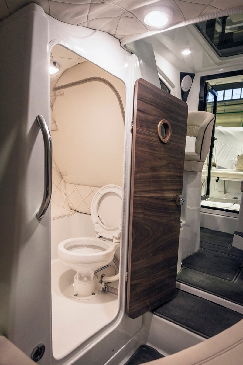 Lavatory cabin with marine electric toilet bowl