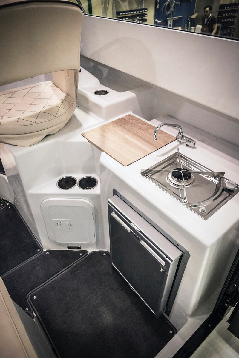 Galley unit with bottle holder