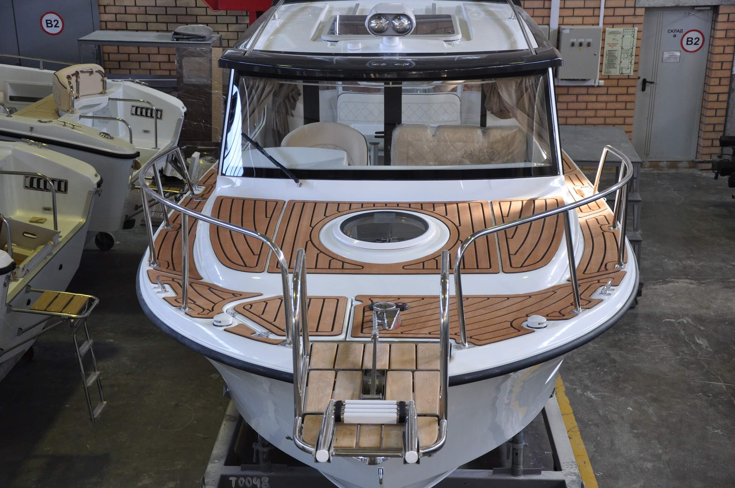 Synthetic teak decking (bow, side decks, cabin and cockpit)
